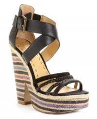 Leave everything out in the open. Eye-catching cutouts in rich leather set apart the stylish Treston wedge sandals by Nine West. Finished with a wedge woven with colorful detail, for added flair. (Clearance) Leave everything out in the open. Eye-catching cutouts in rich leather set apart the stylish Treston wedge sandals by Nine West. Finished with a wedge woven with colorful detail, for added flair. (Clearance)