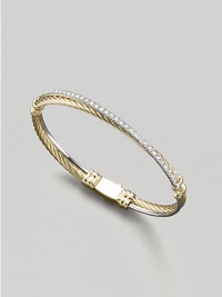 From the Crossover Collection. A slender cable of 18k gold crisscrosses a band of sparkling pavé diamonds in an elegantly understated bangle. Diamonds, 0.57 tcw 18k yellow gold Diameter, about 2½ Made in USA From the Crossover Collection. A slender cable of 18k gold crisscrosses a band of sparkling pavé diamonds in an elegantly understated bangle. Diamonds, 0.57 tcw 18k yellow gold Diameter, about 2½ Made in USA