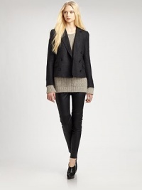 Fully tailored blazer of featherweight wool, finished with a double-breasted front, cropped silhouette and front flap pockets. Notched lapelsLong sleeves with buttoned cuffsDouble-breasted button frontFront flap pocketsFully linedAbout 22 from shoulder to hemWoolDry cleanImported of Italian fabricModel shown is 5'9½ (176cm) wearing US size 4. Fully tailored blazer of featherweight wool, finished with a double-breasted front, cropped silhouette and front flap pockets. Notched lapelsLong sleeves with buttoned cuffsDouble-breasted button frontFront flap pocketsFully linedAbout 22 from shoulder to hemWoolDry cleanImported of Italian fabricModel shown is 5'9½ (176cm) wearing US size 4.