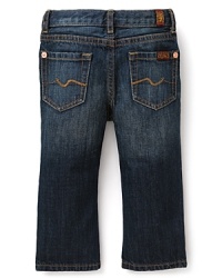 A classic straight leg jean, rendered in a rich blue rinse, with minimal weathering details. A classic straight leg jean, rendered in a rich blue rinse, with minimal weathering details.