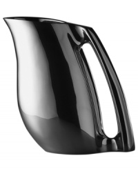 Lend your tabletop dramatic flair as you pour fresh-brewed beverages with this metal pitcher designed by Neil Cohen for Nambé. High-polished metal and long, vertical ridges combine for a chic sensibility. Lend your tabletop dramatic flair as you pour fresh-brewed beverages with this metal pitcher designed by Neil Cohen for Nambé. High-polished metal and long, vertical ridges combine for a chic sensibility.