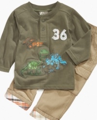 Give a nod to the land before time with this darling dinosaur shirt and cargo pant set from Nannette. Give a nod to the land before time with this darling dinosaur shirt and cargo pant set from Nannette.