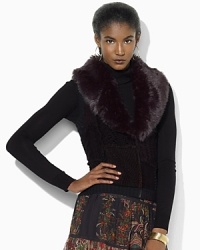A superbly soft faux-beaver trim glamorously accents a chic knit vest with a timeless patchwork pattern. A superbly soft faux-beaver trim glamorously accents a chic knit vest with a timeless patchwork pattern.