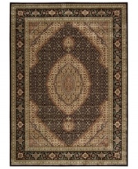 Distinctive flair with roots in Persian design. This exquisitely ornate area rug is abound in deep, striking black and beige tones, highlighted by a dramatic central medallion, and crafted from Nourison's own Opulon™ yarns for a densely woven pile with long-lasting color retention and durability. Distinctive flair with roots in Persian design. This exquisitely ornate area rug is abound in deep, striking black and beige tones, highlighted by a dramatic central medallion, and crafted from Nourison's own Opulon™ yarns for a densely woven pile with long-lasting color retention and durability.