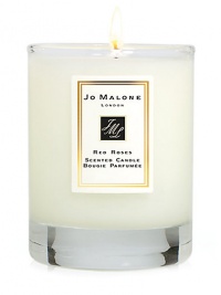 Add the finishing touch to your home by decorating interiors with the refreshingly delicious scent of Red Roses. This 2 oz. scented travel candle will help create the perfect ambience in any room. Candle burn time is 18 hours. Add the finishing touch to your home by decorating interiors with the refreshingly delicious scent of Red Roses. This 2 oz. scented travel candle will help create the perfect ambience in any room. Candle burn time is 18 hours.