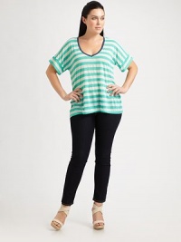 Designed to flatter your figure, this easy jersey top features a feminine neckline and classic stripes.Deep v-neckDolman sleevesContrast solid trimPull-on styleAbout 27 from shoulder to hem50% rayon/50% polyesterMachine washMade in USA Designed to flatter your figure, this easy jersey top features a feminine neckline and classic stripes.Deep v-neckDolman sleevesContrast solid trimPull-on styleAbout 27 from shoulder to hem50% rayon/50% polyesterMachine washMade in USA