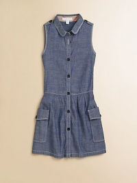 Soft chambray in a sophisticated style, with big buttons, contrast topstitching and a shapely dropped waist.Rounded shirt collarButton shoulder epaulettesSleevelessButton frontDropped waistPleated skirtOversized flap and patch pocketsCottonMachine washImported Please note: Number of buttons may vary depending on size ordered. Soft chambray in a sophisticated style, with big buttons, contrast topstitching and a shapely dropped waist.Rounded shirt collarButton shoulder epaulettesSleevelessButton frontDropped waistPleated skirtOversized flap and patch pocketsCottonMachine washImported Please note: Number of buttons may vary depending on size ordered.