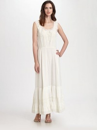 Bohemian and sweet, this lightweight cotton style is trimmed in delicate lace.ScoopneckSleevelessNeckline tieRuffled hemlineConcealed side zipperAllover lace trimAbout 37 from natural waistCottonDry cleanImportedModel shown is 5'10 (177cm) wearing US size Small. Bohemian and sweet, this lightweight cotton style is trimmed in delicate lace.ScoopneckSleevelessNeckline tieRuffled hemlineConcealed side zipperAllover lace trimAbout 37 from natural waistCottonDry cleanImportedModel shown is 5'10 (177cm) wearing US size Small.