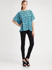 A playful way to achieve that relaxed, contemporary aesthetic, this printed silk top has dropped shoulders and an asymmetrical hem. BoatneckDropped shouldersShort dolman sleevesAsymmetrical cropped front hemSilkDry cleanImportedSIZE & FITModel shown is 5'10 (177cm) wearing US size X-Small/Small. A playful way to achieve that relaxed, contemporary aesthetic, this printed silk top has dropped shoulders and an asymmetrical hem. BoatneckDropped shouldersShort dolman sleevesAsymmetrical cropped front hemSilkDry cleanImportedSIZE & FITModel shown is 5'10 (177cm) wearing US size X-Small/Small.