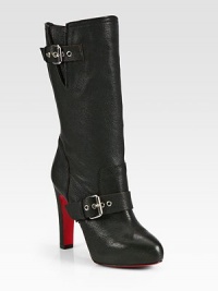 Adjustable buckle straps add a touch of rocker-chic to this pebbled leather boot. Self-covered heel, 4 (100mm)Shaft, 10½Leg circumference, 13Leather upperPull-on styleLeather liningSignature red leather solePadded insoleMade in ItalyOUR FIT MODEL RECOMMENDS ordering one half size up as this style runs small. Adjustable buckle straps add a touch of rocker-chic to this pebbled leather boot. Self-covered heel, 4 (100mm)Shaft, 10½Leg circumference, 13Leather upperPull-on styleLeather liningSignature red leather solePadded insoleMade in ItalyOUR FIT MODEL RECOMMENDS ordering one half size up as this style runs small.