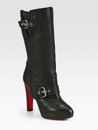 Adjustable buckle straps add a touch of rocker-chic to this pebbled leather boot. Self-covered heel, 4 (100mm)Shaft, 10½Leg circumference, 13Leather upperPull-on styleLeather liningSignature red leather solePadded insoleMade in ItalyOUR FIT MODEL RECOMMENDS ordering one half size up as this style runs small. 