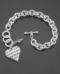 Timeless quality from one of your favorite designers. This GUESS bracelet features a logo charm scripted with Guess, Love and Joy along with a small crystal accent bead. Crafted in silvertone mixed metal with a bar and toggle closure. Approximate length: 7-1/4 inches. Timeless quality from one of your favorite designers. This GUESS bracelet features a logo charm scripted with Guess, Love and Joy along with a small crystal accent bead. Crafted in silvertone mixed metal with a bar and toggle closure. Approximate length: 7-1/4 inches.