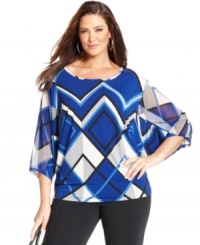 Refresh your look for the season with Style&co.'s three-quarter-sleeve plus size top, highlighted by an eye-catching print.