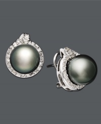Every woman deserves a little extra glitz and glamour. These scintillating studs should do just the trick. Earrings feature a cultured Tahitian pearl at center (11-12 mm) with round-cut diamonds surrounding (3/4 ct. t.w.). Set in 14k white gold. Approximate diameter: 1 inch. Every woman deserves a little extra glitz and glamour. These scintillating studs should do just the trick. Earrings feature a cultured Tahitian pearl at center (11-12 mm) with round-cut diamonds surrounding (3/4 ct. t.w.). Set in 14k white gold. Approximate diameter: 1 inch.