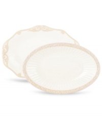 Two of a kind, Butler's Pantry party platters add a vintage touch to every gathering. With embossed vines and fluting in one and scalloped detail on the other, this graceful pair shares a soft, feminine look and superior Lenox craftsmanship. Two of a kind, Butler's Pantry party platters add a vintage touch to every gathering. With embossed vines and fluting in one and scalloped detail on the other, this graceful pair shares a soft, feminine look and superior Lenox craftsmanship.