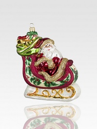 This cheery vintage-style sleigh of exquisite mouth-blown, hand-painted glass has rich Victorian detailing with lots of glitter and shine.Glass5.75H X 4.75L X 2.75DImported This cheery vintage-style sleigh of exquisite mouth-blown, hand-painted glass has rich Victorian detailing with lots of glitter and shine.Glass5.75H X 4.75L X 2.75DImported