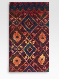 With richness and intricacy that evokes the finest Ikat patterns, this beach towel virtually glows with deep color, exuding a feel of true luxury.Pre-washed and pre-shrunkThick terryCotton70L X 40WMachine washMade in USA With richness and intricacy that evokes the finest Ikat patterns, this beach towel virtually glows with deep color, exuding a feel of true luxury.Pre-washed and pre-shrunkThick terryCotton70L X 40WMachine washMade in USA