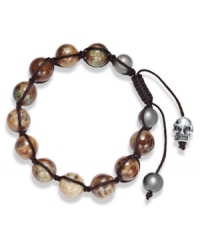 Spiritual-inspired bracelets are all the rage this season! Snap up this hot style from Ali Khan featuring semi-precious natural agate beads and a silver tone skull bead on a trendy black cord. Bracelet adjusts to fit the wrist. Approximate diameter: 2 inches. Approximate length: 12-1/4 inches. Spiritual-inspired bracelets are all the rage this season! Snap up this hot style from Ali Khan featuring semi-precious natural agate beads and a silver tone skull bead on a trendy black cord. Bracelet adjusts to fit the wrist. Approximate diameter: 2 inches. Approximate length: 12-1/4 inches.