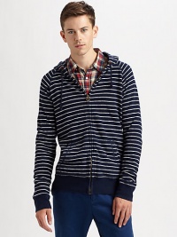 Nautical inspirations overtake a traditional zip-up hoodie, offering a sporty, yet sophisticated finish.Zip frontAttached drawstring hoodKangaroo pocketsBanded cuffs and hemCottonDry cleanImported Nautical inspirations overtake a traditional zip-up hoodie, offering a sporty, yet sophisticated finish.Zip frontAttached drawstring hoodKangaroo pocketsBanded cuffs and hemCottonDry cleanImported