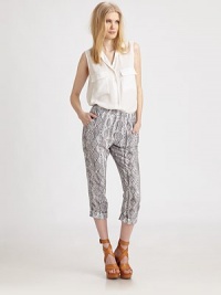 Gorgeous chiffon printed in an eclectic tribal pattern, cropped and gathered in an effortless silhouette.Elastic waistbandFlat frontSlash pocketsCuffed hemRise, about 10Inseam, about 22RayonDry cleanMade in USAModel shown is 5'10 (177cm) wearing US size Small. Gorgeous chiffon printed in an eclectic tribal pattern, cropped and gathered in an effortless silhouette.Elastic waistbandFlat frontSlash pocketsCuffed hemRise, about 10Inseam, about 22RayonDry cleanMade in USAModel shown is 5'10 (177cm) wearing US size Small.