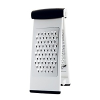 Use this grater on a cutting board, or over a plate for neat, virtually effortless grating. Two stainless steel surfaces create coarse or fine textures. The grater snaps apart for easy cleaning and folds for storage. Use this grater on a cutting board, or over a plate for neat, virtually effortless grating. Two stainless steel surfaces create coarse or fine textures. The grater snaps apart for easy cleaning and folds for storage.