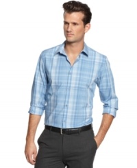 A lightweight plaid pattern captures modern cool and seasonal style with this poplin shirt from Calvin Klein. (Clearance) A lightweight plaid pattern captures modern cool and seasonal style with this poplin shirt from Calvin Klein. (Clearance)