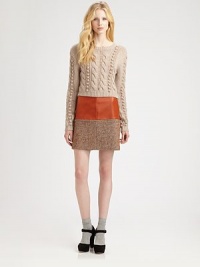Lightweight wool sweater in a cropped, cable-knit silhouette, sprinkled with playful pom-poms. Ribbed crewneckDropped shouldersLong sleevesAbout 19 from shoulder to hemWoolDry cleanMade in USA of imported fabricModel shown is 5'11 (178cm) wearing US size Small. Lightweight wool sweater in a cropped, cable-knit silhouette, sprinkled with playful pom-poms. Ribbed crewneckDropped shouldersLong sleevesAbout 19 from shoulder to hemWoolDry cleanMade in USA of imported fabricModel shown is 5'11 (178cm) wearing US size Small.