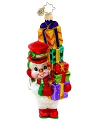 Bring your holiday to new heights with this fine chap from Christopher Radko. Dazzling color and glitter adorn a snowman and stacked gifts with over-the-top splendor. Bring your holiday to new heights with this fine chap from Christopher Radko. Dazzling color and glitter adorn a snowman and stacked gifts with over-the-top splendor.