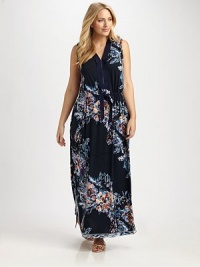 You'll love how the exotic floral print flawlessly complements the elongated silhouette with a zipper placket for a customizable neckline.V-neckSleevelessFront zipperDrawstring waistAbout 42 from natural waist95% polyester/5% elastaneMachine washImported You'll love how the exotic floral print flawlessly complements the elongated silhouette with a zipper placket for a customizable neckline.V-neckSleevelessFront zipperDrawstring waistAbout 42 from natural waist95% polyester/5% elastaneMachine washImported
