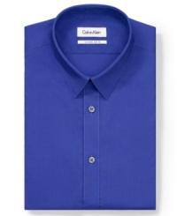 Saturate your style. With an slim fit and energetic boost of color, this Calvin Klein dress shirt instantly calls the shots. Saturate your style. With an slim fit and energetic boost of color, this Calvin Klein dress shirt instantly calls the shots.