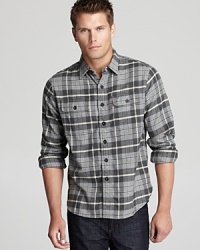 Treading that fine line between rugged and refined, this soft flannel plaid shirt breaks through for a powerful addition to your closet. Treading that fine line between rugged and refined, this soft flannel plaid shirt breaks through for a powerful addition to your closet.