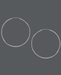 Number one on every stylists' list, every girl needs a pair. Touch of Silver's simple hoop earrings are extremely affordable with their silver-plated brass setting and sterling silver backing. Approximate diameter: 2-1/10 inches. Number one on every stylists' list, every girl needs a pair. Touch of Silver's simple hoop earrings are extremely affordable with their silver-plated brass setting and sterling silver backing. Approximate diameter: 2-1/10 inches.