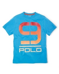 Accented with a bold, multi-hued 9, an active tee is crafted from cotton jersey for breathability and easy movement during athletic endeavors. Accented with a bold, multi-hued 9, an active tee is crafted from cotton jersey for breathability and easy movement during athletic endeavors.