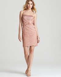 Delicate chiffon trickles along Sue Wong's glamorous, beaded dress, a standout style with timeless appeal. Delicate chiffon trickles along Sue Wong's glamorous, beaded dress, a standout style with timeless appeal.
