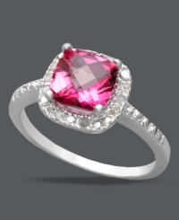 Sparkle in her favorite color. Victoria Townsend's dynamic statement ring highlights a cushion-cut pink topaz (1-3/4 ct. t.w.) edged by sparkling, round-cut diamonds (1/10 ct. t.w.). Set in sterling silver. Size 7.