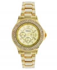 Shimmer and shine with this regal watch by Style&co. Gold tone mixed metal bracelet and round case. Bezel embellished with crystal accents. Champagne dial features numerals at twelve, four and eight o'clock, stick indices, minute track, three multifunctional subdials and logo. Quartz movement. Two-year limited warranty. Shimmer and shine with this regal watch by Style&co. Gold tone mixed metal bracelet and round case. Bezel embellished with crystal accents. Champagne dial features numerals at twelve, four and eight o'clock, stick indices, minute track, three multifunctional subdials and logo. Quartz movement. Two-year limited warranty.
