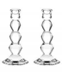 Vera Wang's architecturally inspired Orient candlesticks embody elegance in fine crystal with bold faceted cuts reminiscent of the designer's classic bridal jewelry. Vera Wang's architecturally inspired Orient candlesticks embody elegance in fine crystal with bold faceted cuts reminiscent of the designer's classic bridal jewelry.