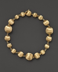 Gleaming beads of textured 18K yellow gold, exclusively for Bloomingdale's from the Marco Bicego Africa collection. Gleaming beads of textured 18K yellow gold, exclusively for Bloomingdale's from the Marco Bicego Africa collection.
