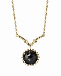 A faceted melanite stone in a beaded setting dangles delicately from a 14K gold chain. Necklace by PANDORA. A faceted melanite stone in a beaded setting dangles delicately from a 14K gold chain. Necklace by PANDORA.