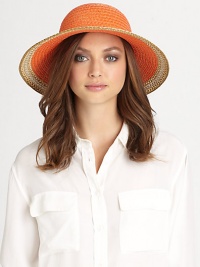 This dramatic, packable straw topper features signature logo rivets, elasticized inner band and an oversized, sloped brim for maximum sun protection and style.Brim, about 4.25Elasticized inner band fits most95% UVA/UVB protectionPolypropylene/polyesterSpot cleanImported and hand-finished in the USA This dramatic, packable straw topper features signature logo rivets, elasticized inner band and an oversized, sloped brim for maximum sun protection and style.Brim, about 4.25Elasticized inner band fits most95% UVA/UVB protectionPolypropylene/polyesterSpot cleanImported and hand-finished in the USA