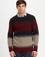 A lightweight, layering essential for this season that will transition easily into the cooler months, knitted in a rich wool and finished in a modern stripe pattern that lends a relaxed-cool look.CrewneckRibbed knit collar, cuffs and hem80% wool/20% polyamideDry cleanImported