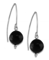 That's a wrap. Fashion-forward and purely sophisticated, these black onyx (10 mm) hook earrings provide a bit of gleam atop any formal or casual dress. Earrings set in sterling silver. Approximate drop: 1-1/2 inch.