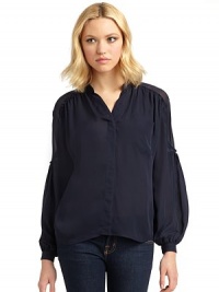 THE LOOKV-neckFront button closureLong button cuff sleevesSheer panels with ruffled accents on shouldersChest patch pocketTHE FITAbout 22 from shoulder to hemTHE MATERIALSilkCARE & ORIGINDry cleanImportedModel shown is 5'10 (177cm) wearing US size Small. THE LOOKV-neckFront button closureLong button cuff sleevesSheer panels with ruffled accents on shouldersChest patch pocketTHE FITAbout 22 from shoulder to hemTHE MATERIALSilkCARE & ORIGINDry cleanImportedModel shown is 5'10 (177cm) wearing US size Small.