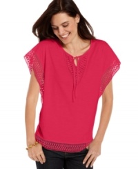 Inspired by a handcrafted poncho silhouette, this petite summer top from Jones New York Signature is an easy basic you'll love with jeans! Inspired by a handcrafted poncho silhouette, this petite summer top from Jones New York Signature is an easy basic you'll love with jeans!
