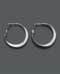 Perfectly versatile, with just a touch of flair. Twisted sterling silver makes these hoops a new favorite. Approximate diameter: 1 inch. Perfectly versatile, with just a touch of flair. Twisted sterling silver makes these hoops a new favorite. Approximate diameter: 1 inch.