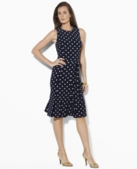 Smooth matte jersey flatters the body in a carefree, flirty silhouette with an allover polka-dot pattern on Lauren by Ralph Lauren's petite dress. Smooth matte jersey flatters the body in a carefree, flirty silhouette with an allover polka-dot pattern on Lauren by Ralph Lauren's petite dress.