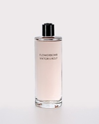 FLOWERBOMB is a floral explosion, a profusion of flowers that has the power to make everything seem more positive. Opulent and full-bodied, the iconic and multi-faceted Viktor & Rolf Flowerbomb bottle is now available in a luxurious, refillable version with a precious pink metallic seal and screw-top cap. Let the magic of Viktor & Rolf live on with the Eau de Parfum Refill to recharge your refillable bottle. FLOWERBOMB is a floral explosion, a profusion of flowers that has the power to make everything seem more positive. Opulent and full-bodied, the iconic and multi-faceted Viktor & Rolf Flowerbomb bottle is now available in a luxurious, refillable version with a precious pink metallic seal and screw-top cap. Let the magic of Viktor & Rolf live on with the Eau de Parfum Refill to recharge your refillable bottle.
