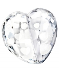 A symbol of your love, this Swarovski figurine features heart-shaped laser engravings that create a stunning three-dimensional effect in clear and silver-colored crystal. A symbol of your love, this Swarovski figurine features heart-shaped laser engravings that create a stunning three-dimensional effect in clear and silver-colored crystal.