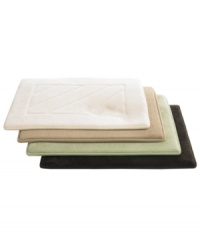 The ultimate indulgence... for your feet! Step out in personalized comfort with the Angles memory foam bath mat, featuring an absorbent, quick-dry fleece cover and modern memory foam that conforms to the contours of your foot. The ultimate indulgence... for your feet! Step out in personalized comfort with the Angles memory foam bath mat, featuring an absorbent, quick-dry fleece cover and modern memory foam that conforms to the contours of your foot.