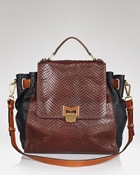Mixed material handbags top this season's must-list. This Treesje satchel takes the trend into cool, carryall territory with its spacious silhouette and mash-up of textured leathers. Mixed material handbags top this season's must-list. This Treesje satchel takes the trend into cool, carryall territory with its spacious silhouette and mash-up of textured leathers.
